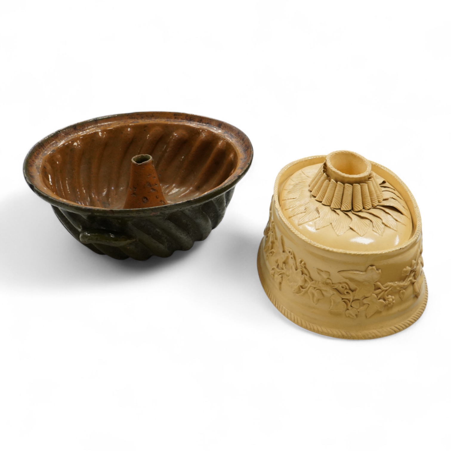 A 19th century oval caneware game/pie dish and cover, 24cm wide with an antique cake mould, (2)